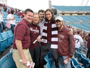 All four. And a girl who snuck in the photo.